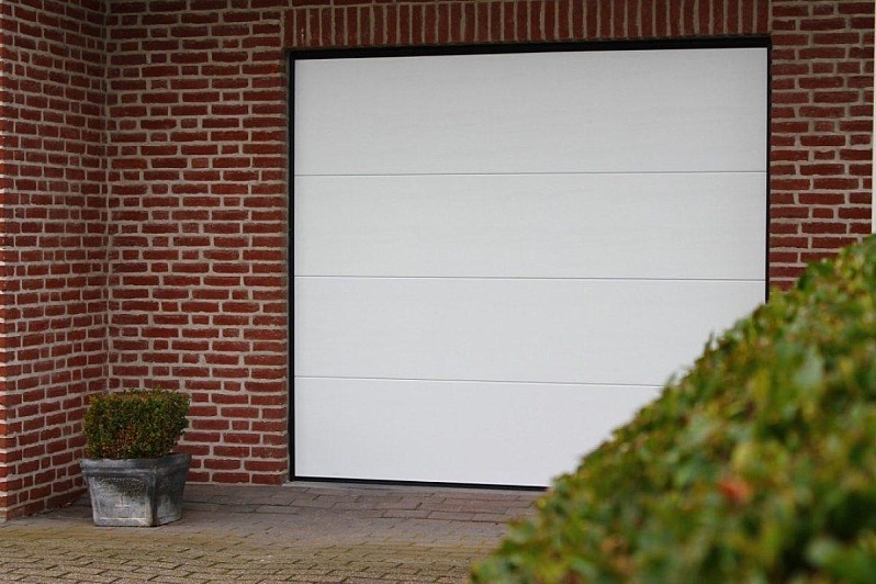 Een harmonieuze gevel: combineer garagepoort, ramen en zonwering